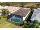 Home's private screened pool and patio area at 10114 Glenmore Ave, Bradenton, FL 34202