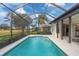 Relaxing screened-in pool overlooking a lush green golf course at 10114 Glenmore Ave, Bradenton, FL 34202