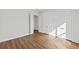 Spacious bedroom with hardwood floors and double doors to closet at 11323 Rivers Bluff Cir, Lakewood Ranch, FL 34202