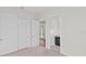 Bright bedroom with double doors leading to the bathroom and hallway at 11323 Rivers Bluff Cir, Lakewood Ranch, FL 34202