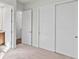 Bright bedroom with doors to the bathroom and hallway at 11323 Rivers Bluff Cir, Lakewood Ranch, FL 34202