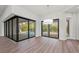 Bright dining room with sliding glass doors leading to the pool at 11323 Rivers Bluff Cir, Lakewood Ranch, FL 34202