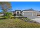 Beautiful new construction home with 3-car garage and lush landscaping at 11323 Rivers Bluff Cir, Lakewood Ranch, FL 34202