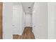 Clean hallway with light walls and hardwood floors at 11323 Rivers Bluff Cir, Lakewood Ranch, FL 34202