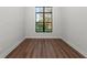 Sunlit office with hardwood floors and a large window at 11323 Rivers Bluff Cir, Lakewood Ranch, FL 34202