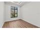 Bright office space with large window and hardwood floors at 11323 Rivers Bluff Cir, Lakewood Ranch, FL 34202
