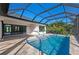 Enclosed pool with a screened patio at 11323 Rivers Bluff Cir, Lakewood Ranch, FL 34202