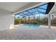Enclosed pool area with a screened patio at 11323 Rivers Bluff Cir, Lakewood Ranch, FL 34202