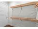 Bright walk-in closet with built in shelves at 11323 Rivers Bluff Cir, Lakewood Ranch, FL 34202
