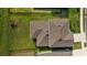 House, brown roof, backyard, green lawn at 11628 Middle Fork Way, Parrish, FL 34219