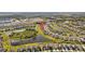 Aerial view showcasing a home's location within a residential community at 11628 Middle Fork Way, Parrish, FL 34219