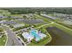 Community pool and clubhouse; neighborhood homes nearby at 11628 Middle Fork Way, Parrish, FL 34219