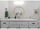 Vanity with a large mirror and updated features at 11628 Middle Fork Way, Parrish, FL 34219