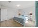 Spacious bedroom with king-size bed and natural light at 11628 Middle Fork Way, Parrish, FL 34219