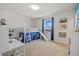bedroom with built-in bunk bed, desk, and ample storage at 11628 Middle Fork Way, Parrish, FL 34219