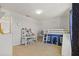 bedroom with built-in bunk bed, desk, and storage at 11628 Middle Fork Way, Parrish, FL 34219