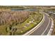 Aerial view of a community bike park with winding trails at 11628 Middle Fork Way, Parrish, FL 34219