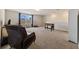 Bright bonus room with comfy seating and a view at 11628 Middle Fork Way, Parrish, FL 34219