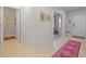 View of entryway with half-bathroom and access to other rooms at 11628 Middle Fork Way, Parrish, FL 34219