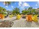 Community fire pit with seating and landscaping at 11628 Middle Fork Way, Parrish, FL 34219