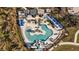Overhead view of a community pool, expansive deck, and clubhouse at 11628 Middle Fork Way, Parrish, FL 34219
