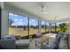 Spacious screened porch with pond and community views at 11628 Middle Fork Way, Parrish, FL 34219