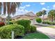 Attractive home exterior with landscaping and driveway at 1214 Berkshire Cir, Venice, FL 34292