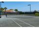 Well-maintained tennis court with clear markings at 1214 Berkshire Cir, Venice, FL 34292