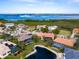 Community aerial view; waterfront homes and canals at 12334 Baypointe Ter, Cortez, FL 34215