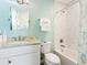 Guest bathroom with a shower/tub combo and vanity at 12334 Baypointe Ter, Cortez, FL 34215