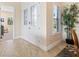 Bright entryway with double doors and tile flooring at 12334 Baypointe Ter, Cortez, FL 34215