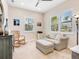 Bright office space with comfortable seating and natural light at 12334 Baypointe Ter, Cortez, FL 34215