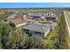 Aerial view of neighborhood featuring single-Gathering homes, lakes, and community amenities at 12410 Osorio Ct # 101, Sarasota, FL 34238