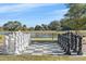 A full chess set is ready for play, set outdoors near a pond at 12410 Osorio Ct # 101, Sarasota, FL 34238