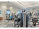 Well-equipped gym with modern exercise machines and natural light at 12410 Osorio Ct # 101, Sarasota, FL 34238