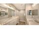 Elegant bathroom with double vanity and walk-in shower at 12681 Palatka Dr, Venice, FL 34293