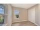 Spacious bedroom with wood-look floors and a window at 12681 Palatka Dr, Venice, FL 34293