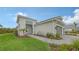 House exterior showcasing landscaping and walkway at 12681 Palatka Dr, Venice, FL 34293