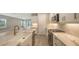 Modern kitchen with white cabinets and a farmhouse sink at 12681 Palatka Dr, Venice, FL 34293