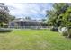 Large backyard with grassy area and privacy fence at 12732 Rockrose Gln, Lakewood Ranch, FL 34202