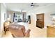 Spacious living room with a large sectional sofa and tile floors at 12732 Rockrose Gln, Lakewood Ranch, FL 34202