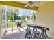 Screened patio with a grill and outdoor seating area at 12732 Rockrose Gln, Lakewood Ranch, FL 34202