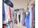 Large walk-in closet with ample hanging space and shelving at 12732 Rockrose Gln, Lakewood Ranch, FL 34202