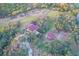 Aerial view of property showing home and outbuildings at 12845 N Branch Rd, Sarasota, FL 34240