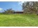 Open pasture with distant home and trees at 12845 N Branch Rd, Sarasota, FL 34240