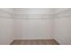 Walk-in closet with wire shelving and carpeted floor at 13009 Cedar Elm Lane, Parrish, FL 34219