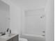 Bathroom with a bathtub, vanity, and toilet at 13017 Cedar Elm Lane, Parrish, FL 34219