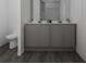 Bathroom with a double vanity, toilet, and dark floors at 13017 Cedar Elm Lane, Parrish, FL 34219