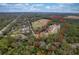 Aerial view of property showing home and surrounding land at 14150 Manatee Rd, Parrish, FL 34219