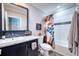 Clean bathroom with a single sink, toilet, and tub shower at 14150 Manatee Rd, Parrish, FL 34219